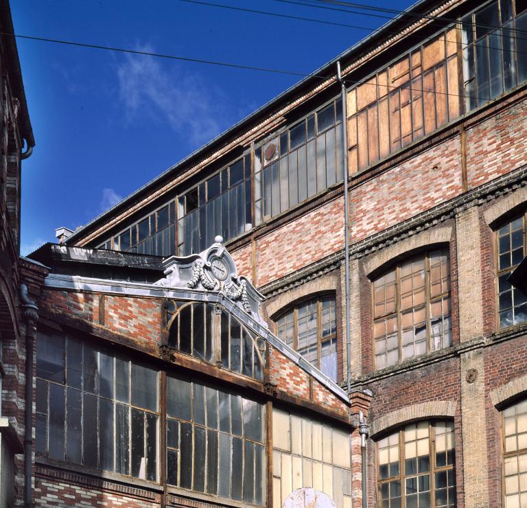 Usine de blanchiment et de teinturerie de laine Boujiard et Grubben, puis usine de confection Rousseau s. a., puis Manufacture d'Elbeuf s. a.