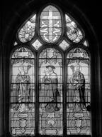 verrière historiée : Saint Narcisse, Saint Charles Borromée, Saint Augustin (baie 6)