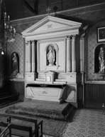 ensemble de l'autel secondaire nord : autel tombeau, retable architecturé et tabernacle
