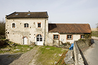 moulin à farine dit moulin de Carcagny, puis moulin à huile, puis laiterie industrielle dite Société coopérative laitière de la Seulles, puis Jonot et Cie, actuellement maison