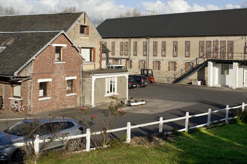 moulin à blé, puis moulin à huile, puis fromagerie industrielle de la Société laitière des fermiers normands, puis des Laiteries de Bernières, puis de la Société Fromagère de Jort