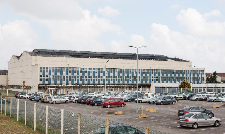 usine de produits explosifs dite pyrotechnie de Cormelles, puis usine d'armes des Aciéries de Pompey, puis usine de construction automobile Citroën, puis Peugeot PSA