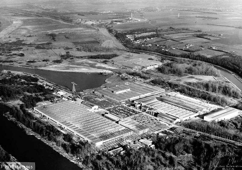 usine de construction navale des Chantiers navals français, puis Chantiers navals de Caen, puis usine de construction automobile Saviem, puis Renault véhicules industriels (RVI), puis Renault Trucks