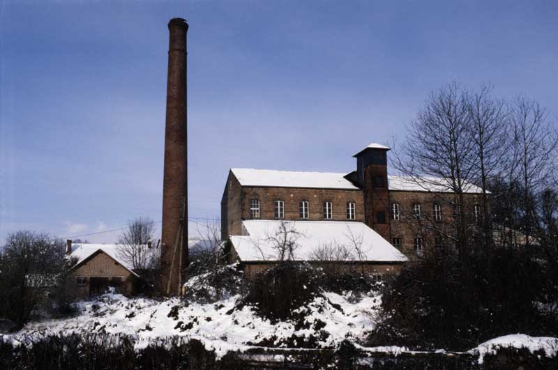 moulin à blé et filature de lin, puis filature de lin, puis laiterie industrielle, puis chocolaterie, actuellement cidrerie distillerie