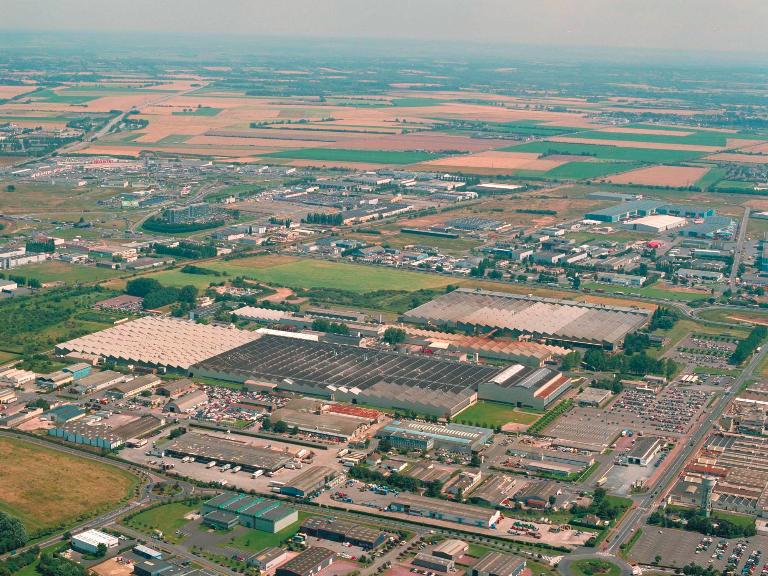 usine de produits explosifs dite pyrotechnie de Cormelles, puis usine d'armes des Aciéries de Pompey, puis usine de construction automobile Citroën, puis Peugeot PSA