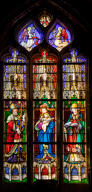 verrière, baie 4 : Vierge à l'Enfant, saint Ouen, saint Sulpice