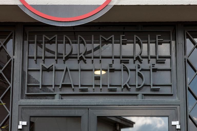 entrepôt commercial dit entrepôt des tabacs de Caen (SEITA), puis imprimerie dite Imprimerie Malherbe, actuellement magasin de commerce Bonnaventure et établissement de production audiovisuelle Bazarnaom