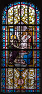 ensemble de 2 verrières mixte historiées, hagiographique et commémoratives de la guerre de 1914-1918 : Jésus bénissant les enfants, saint André devant le consul ; à la mémoire d'André Massy, de Henri et Auguste Herman (baies 7 et 10)