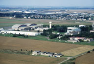 établissement aéronautique dit base aérienne de Caen Carpiquet, puis caserne du 18e Régiment de Transmission, dite quartier Koenig, actuellement parc d'activité