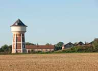 Carreau de Soumont : installations de la mine, avec château d'eau et ateliers, vue du nord-est.