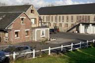 moulin à blé, puis moulin à huile, puis fromagerie industrielle de la Société laitière des fermiers normands, puis des Laiteries de Bernières, puis de la Société Fromagère de Jort