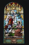 verrière hagiographique et commémorative de la guerre de 1914-1918 : Sainte Jeanne d'Arc entend des voix, à la mémoire d'Auguste Savary et de son fils Edouard (baie 9)