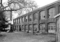 Filature de laine Laurent, puis Quidet, puis Société Manufacturère des Draperies d'Elbeuf, puis usine de matériel optique de la Société Parisienne de Jumelles à Prismes s.a. et fonderie Fontalu s.a.r.l.